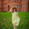 Woman in Yellow Dress Running in Dandelion Field