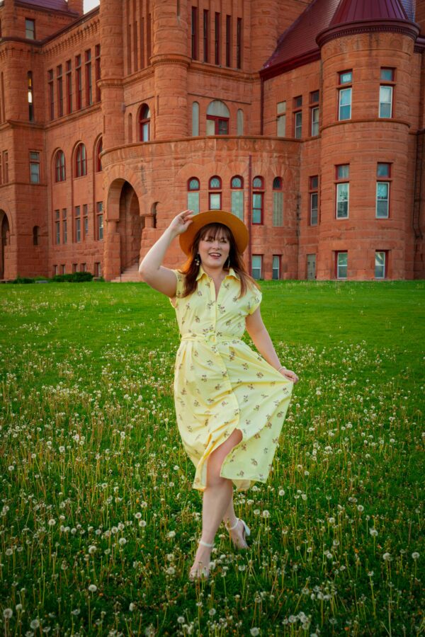 pexels-photo-32478234-32478234 Woman in Yellow Dress Running in Dandelion Field